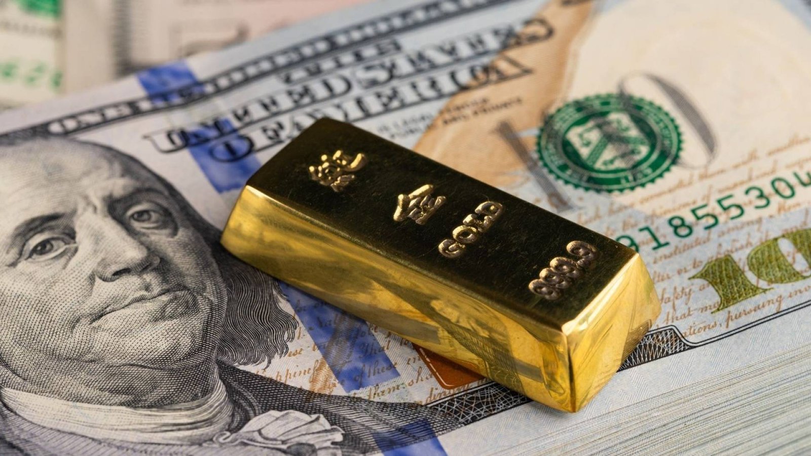 «أسواق المعادن الثمينة تحت المجهر» تنبؤات بتأثير الدولار على الذهب كملاذ آمن